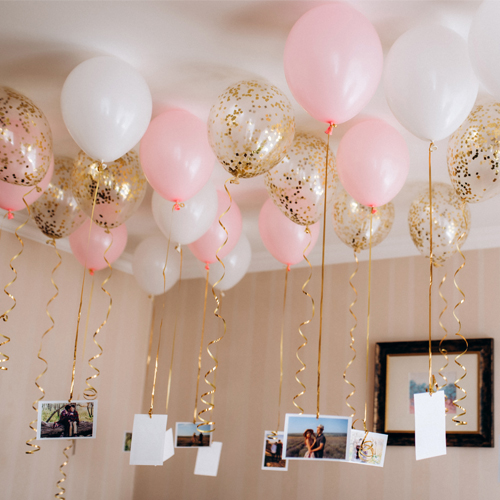 Ceiling Balloons with photos hanging